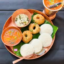 Idli, medhu vadai, and sambar served together