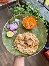 Layered parotta served with salna